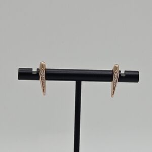 Kendra Scott rose gold spike earrings with clear crystals